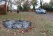 Residents of Lobelia Street rake the leaves from municipal trees into heaps on sidewalks and set them alight. Photo: Adele Louw (Carletonville and Fochville Herald)