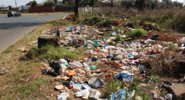 The corner is again filled with rubbish.