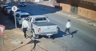 This footage from a CPI security camera shows the two thugs walking up to their victim's bakkie.