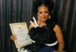 The community builder and organiser holding her recent ward