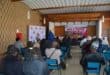 Local artists being addressed during the meeting.