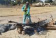The residents use various ways to fix the many potholes in the town's streets. Photo: Supplied