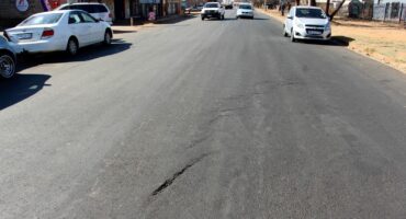 This footage from a CPI security camera shows the two thugs walking up to their victim's bakkie.Photo: Adele Louw (Carletonville and Fochville Herald)