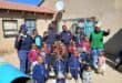 The police members with some of the little ones that they visited.
