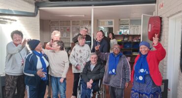 The retired nurses with some of the residents of Rotalia Home. Photo: Supplied