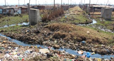 Residents must constantly live among the streams of sewage. Photo: Carletonville and Fochville Herald