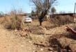 The car ploughed through the fences of four yards before it came to a standstill near a shack. Photo: Adele Louw (Carletonville and Fochville Herald)