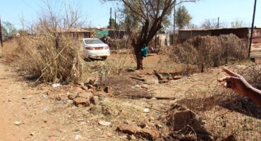 The car ploughed through the fences of four yards before it came to a standstill near a shack. Photo: Adele Louw (Carletonville and Fochville Herald)