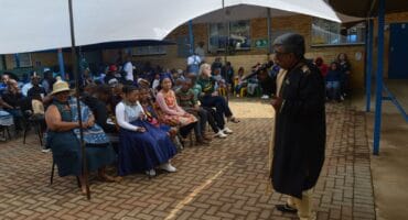 The principal addressing the learners during the Heritage Day Commemoration.