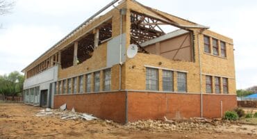 The old building at the corner of Annan Road and Kaolin Street is being demolished to make way for a new strip mall.