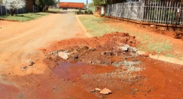 According to residents, water has been leaking from this corner at 6th Avenue in Welverdiend for weeks. Photo: Adele Louw (Carletonville and Fochville Herald)