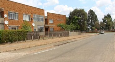 The shootings took place in the parking of the Zambesi Court Flats. Photo: Adele Louw (Carletonville and Fochville Herald)