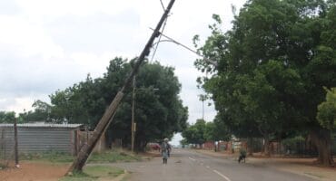 The damaged street light pole poses a danger to pedestrians and vehicles. Photo: Adele Louw (Carletonville and Fochville Herald)