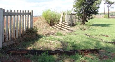 One of the holes in the Carletonville graveyard's fence. Photo: Adele Louw (Carletonville and Fochville Herald)