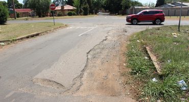 The huge potholes at the turn-off into Umgeni Street from Coronation Street. Photo: Adele Louw (Carletonville and Fochville Herald)