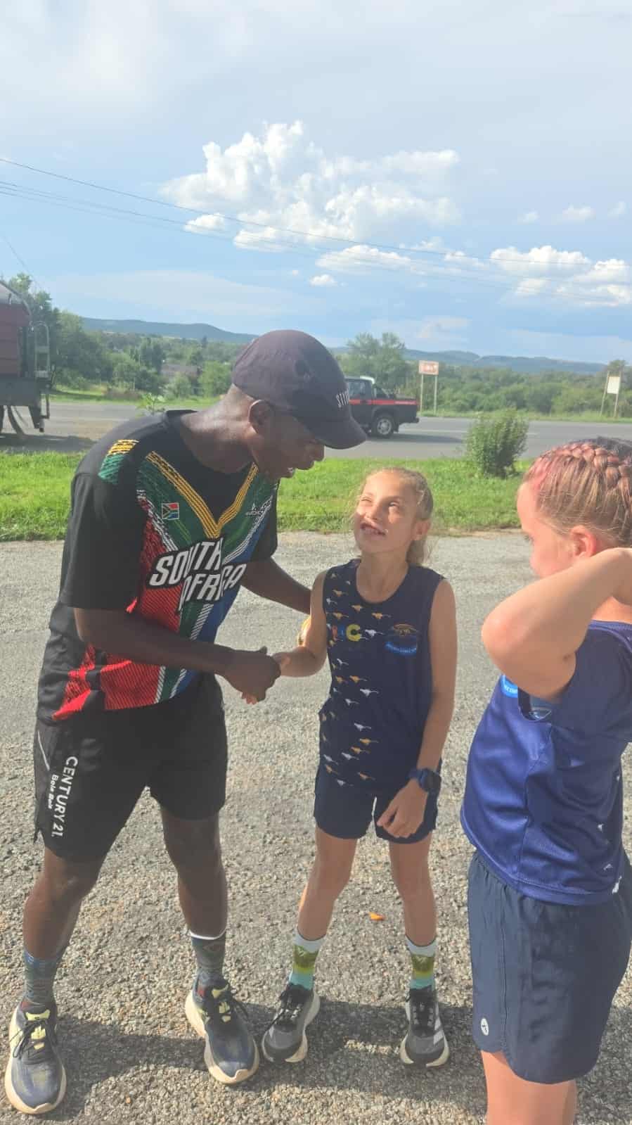 Boiki talking to one of the young athletes during his visit in Parys.