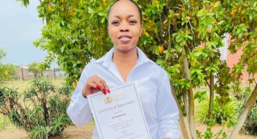 Me Makhanya with the certificate she received.