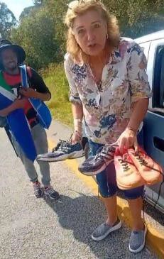 Their first visitor! Hannelie Enslin , a broker from Sasolburg who came looking for us on the road. She gave them some shoes and a donaton. Photo: Supplied
