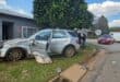 Een van die voertuie is met die impak van die botsing in 'n steen- en palisade omheining in van 'n hoekhuis by die kruising. Foto: Liezl Scheepers