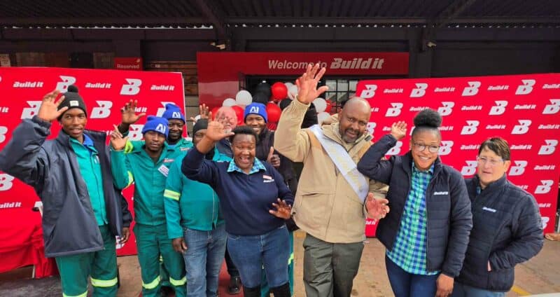 Staff from Pula Build-it celebrating with Paul Maqase, the winner of the Hyundai Grand i10. Photo: Liezl Scheepers