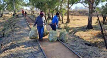 Volunteers collecting bags of refuse as part of the wetland clean-up campaign. Photo credit: Danie Venter