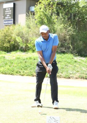 The school principal of Ntshwephepa Primary School, Mr Moloantoa, teeing off.