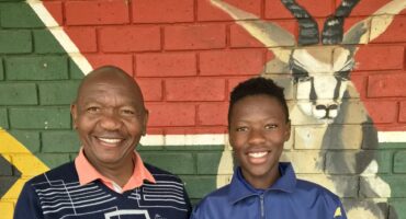 Siyabonga Qiba together with Ntshwephepa's principal, Mr Moloantoa.. Photo: Supplied
