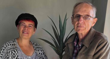 Theresa Poolman ontvang haar boekprys van prof. Marius Nel. Foto: Liezl Scheepers