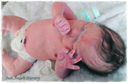 Janice studies the anatomy of premature babies to be able to get each micro-vein and baby blotch just perfect Photo: Just Angels website