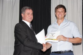 North West Cricket president, Mr. Archie Pretorius with Wihan Lubbe, North West Dragons' best batsman.