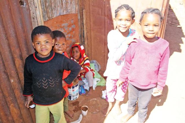 Children playing at the shelter.  Photo: Selogile Leshage