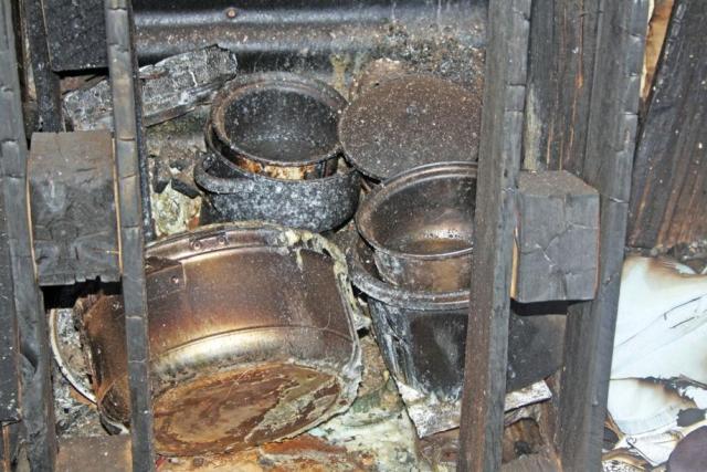 Pots and eating utensils that were ravaged by the fire. 