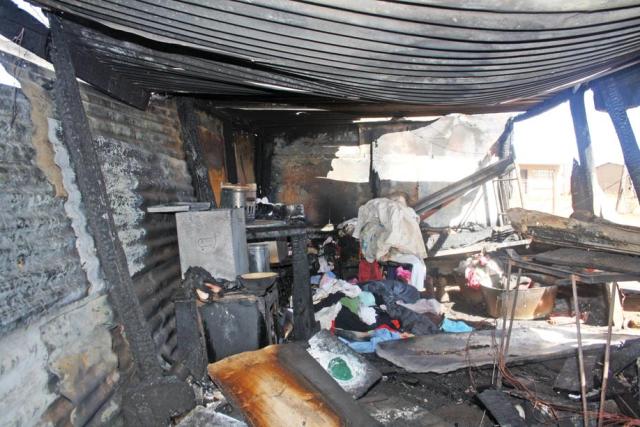 The family home that was destroyed after a domestic dispute.  Photos: Selogile Leshage