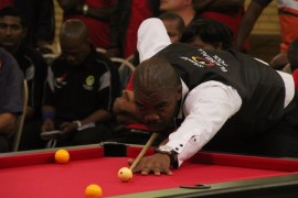 Lebohang Maseko takes aim towards victoryin the 2016 SANDF Balckball Pool Championships that took place in Potchefstroom from 26-30 September.