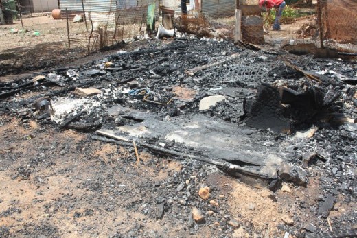 The remains of the shack where a mother and her one-month-old baby boy met their tragic fate on Thursday night. Photo: Selogile Leshage