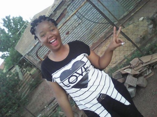 Nisha, vier saam haar familie nadat sy Gr.10 geslaag het. 