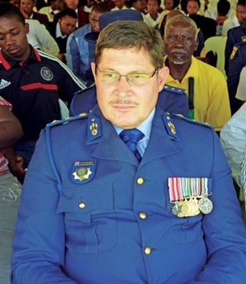 Lt-Col Van Schalkwyk listens to the speaker of the day.