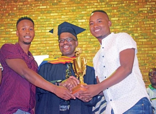 Laws Mohlomi with Amogelang Lefakane (left)and Tshidiso Moremane from BA Seobi, which won the trophy for the best school in Ikageng.