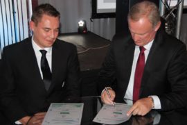 Mr. Francois Strydom, CEO of Senwes signs a new contract to extend Senwes' sponsorship to three years.