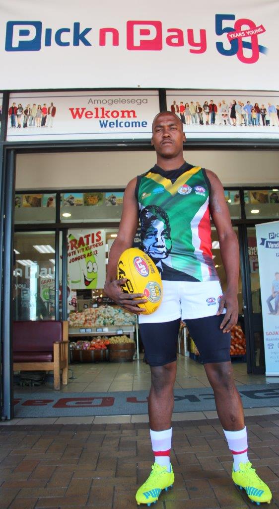 Godfrey Molohlanyi packs merchandise at Pick n Pay Vanderhoff Park by day and, after hours, he plays Aussie Rules Football for South Africa.