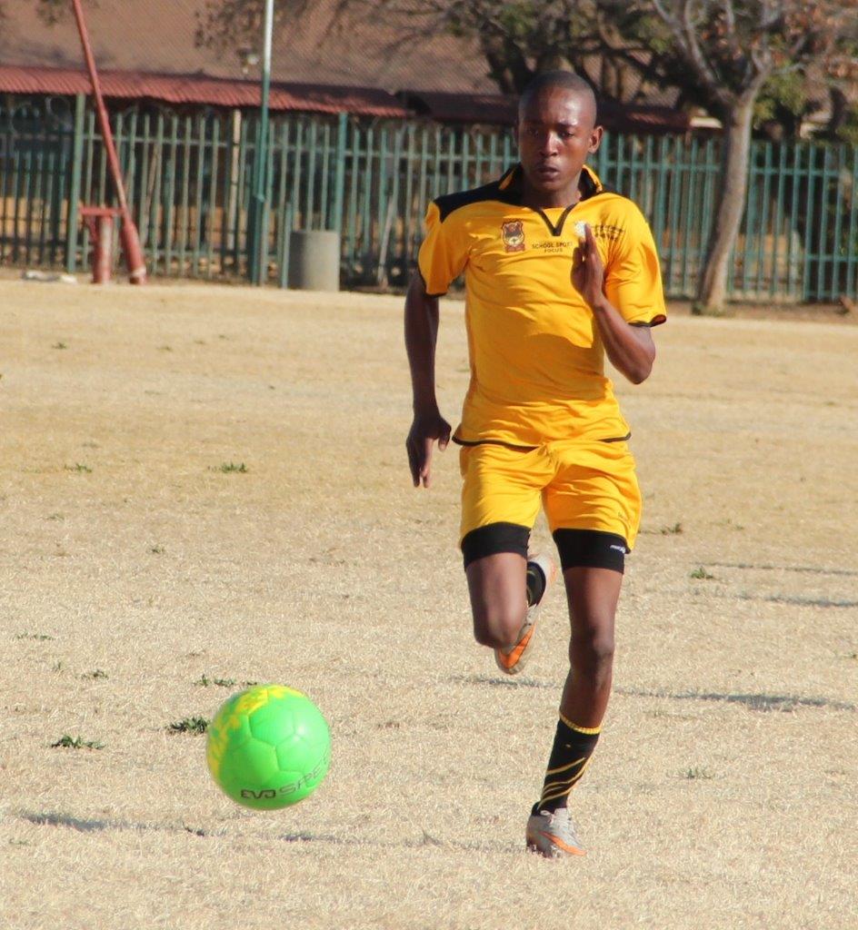 Tshidiso Legoale of HTS Potch on the attack.