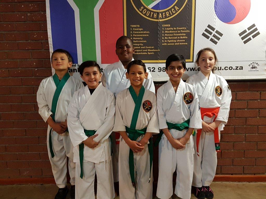 Junior members who performed: Back: William Avis (gold, 2 silver, 2 bronze), Onthatile Tshetlane (gold), Maxelle Erasmus (3 gold, silver). Front: Zia Hassim (bronze), Cael Witten (gold) and Farhaan Gani (bronze).