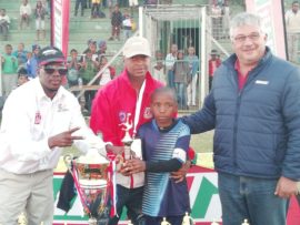 Oupa Mothibedi (organiser), Lucky Khune (ambassador), with the winning captain and player of the tournament, Stambo, and Herman Steyn (owner of Build It Potchefstroom).