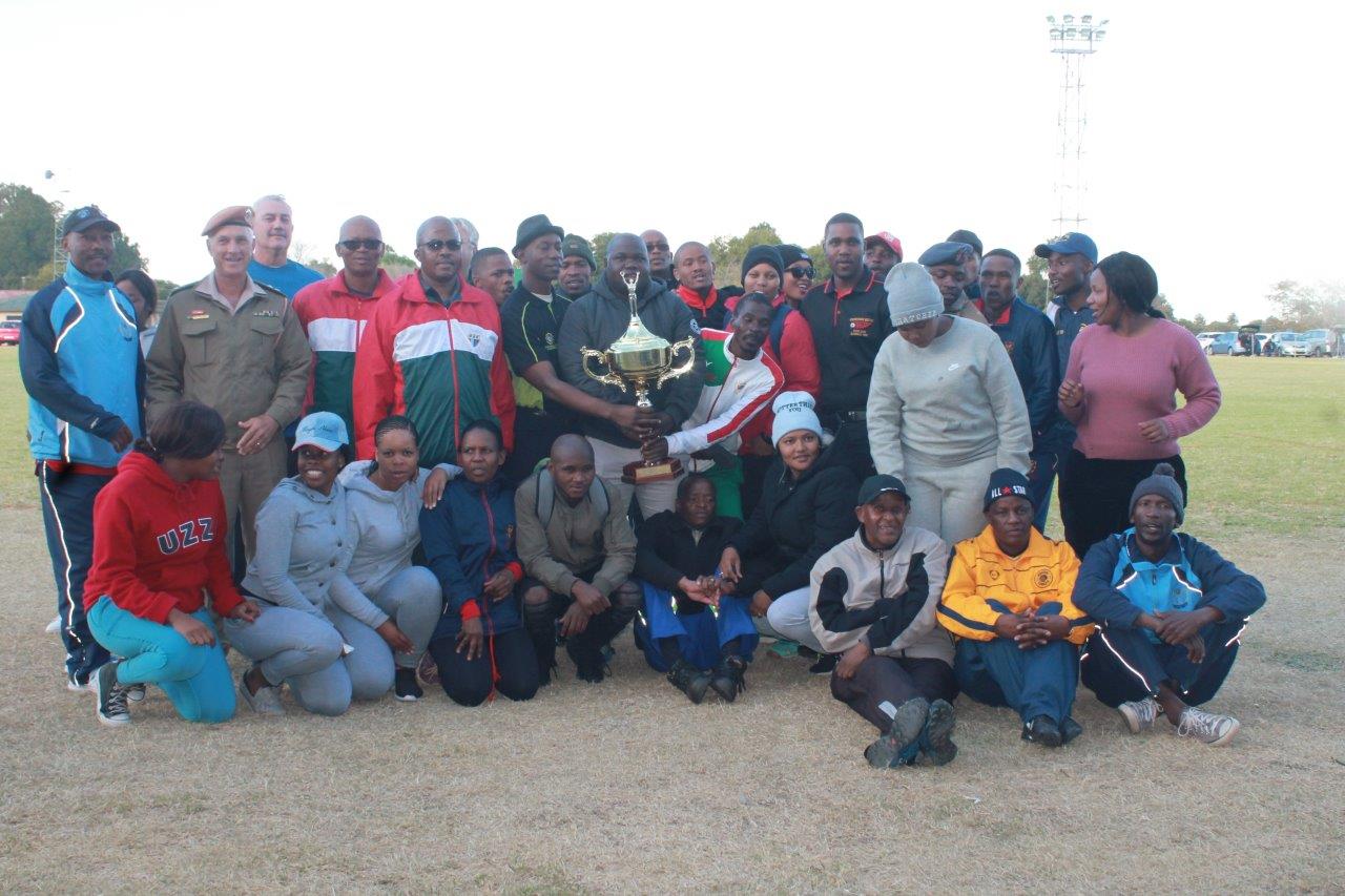 Some of the members of the victorious 4 Artillery Regiment team with Lt Col Mosimane.