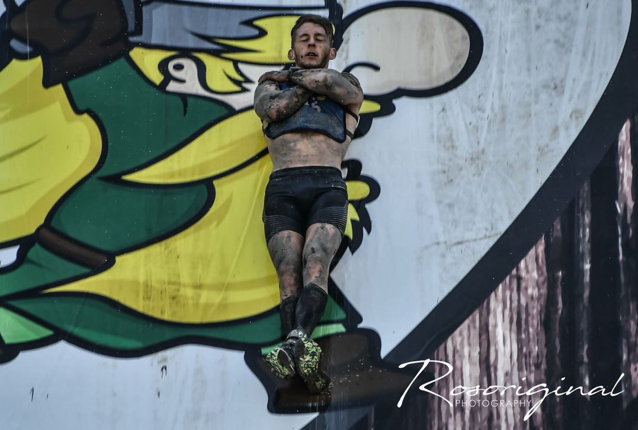 Armin Botha slides down one of the obstacles in the Strong Viking OCR Race. Photo: Rosoriginal Photography