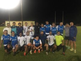 The University of Réunion Sevens Team with Pieter van der Berg and Jonathan Mokuena of the NWU