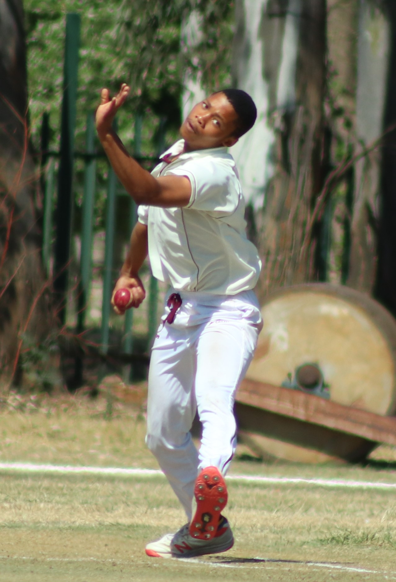 Karabelo Matlawe sends another spin delivery towards the wickets.