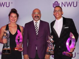 The NWU Sportswoman (Jo-Ané van Dyk) and Sportsman of the Year (Chederick van Wyk) together with prof. Daryl Balia.
