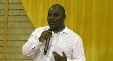 Manager with microphone