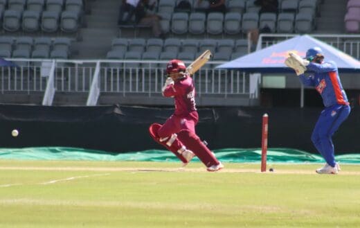 Cricket player playing a shot